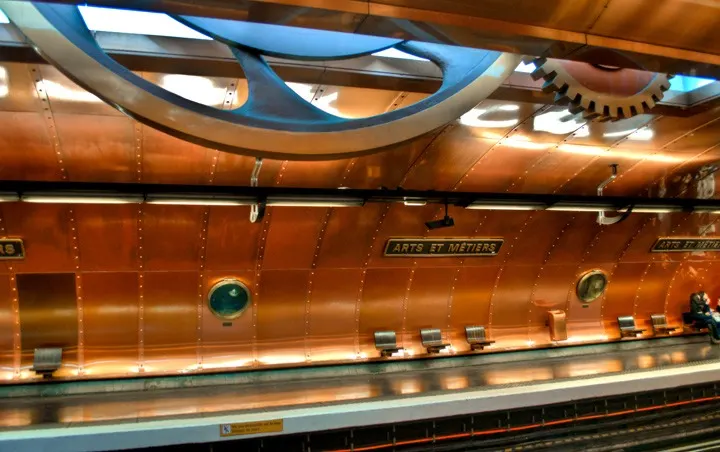 Cogs and copper walls at Arts et Métiers station in Paris