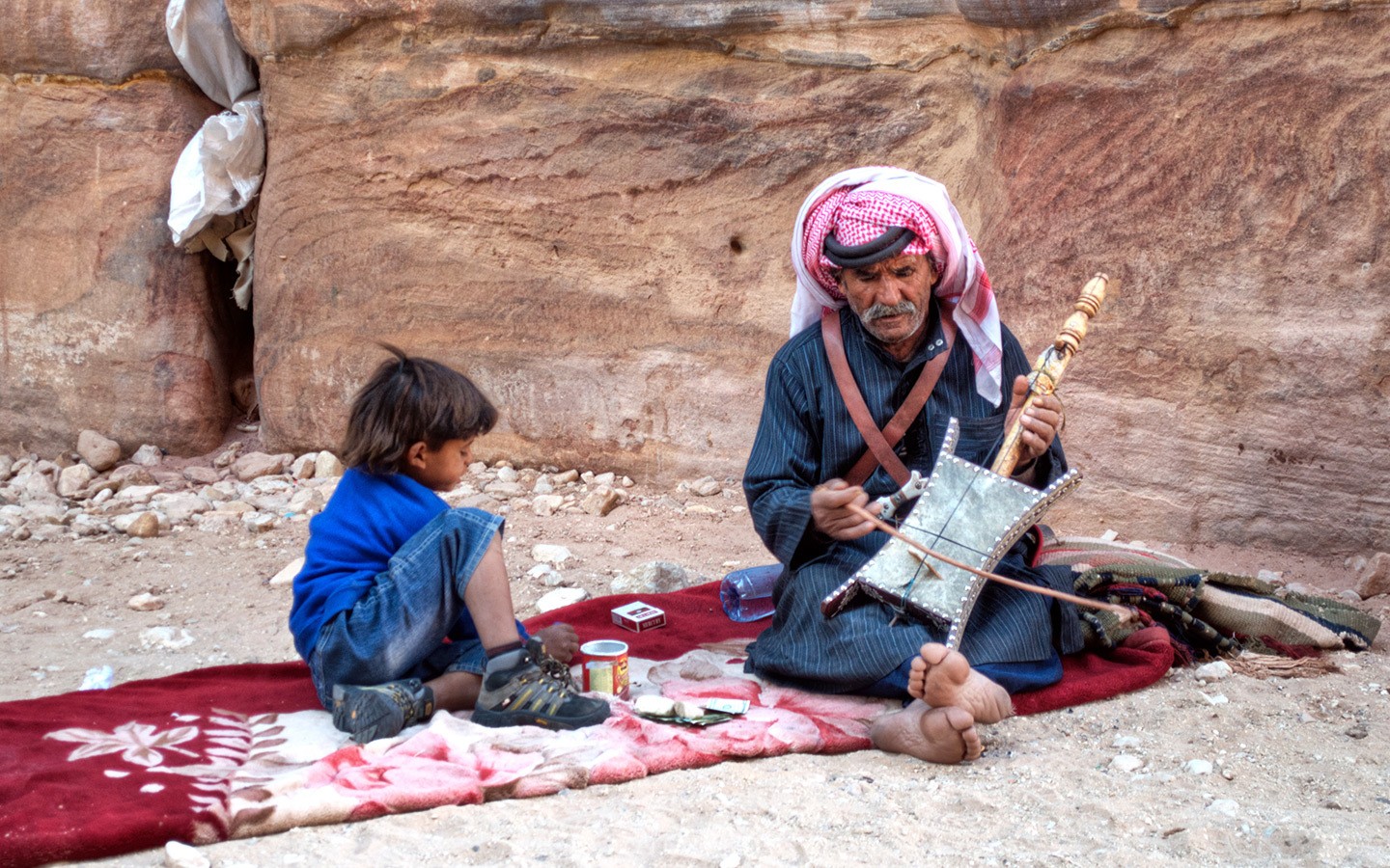 Bedouin musician playing a rebab in Jordan