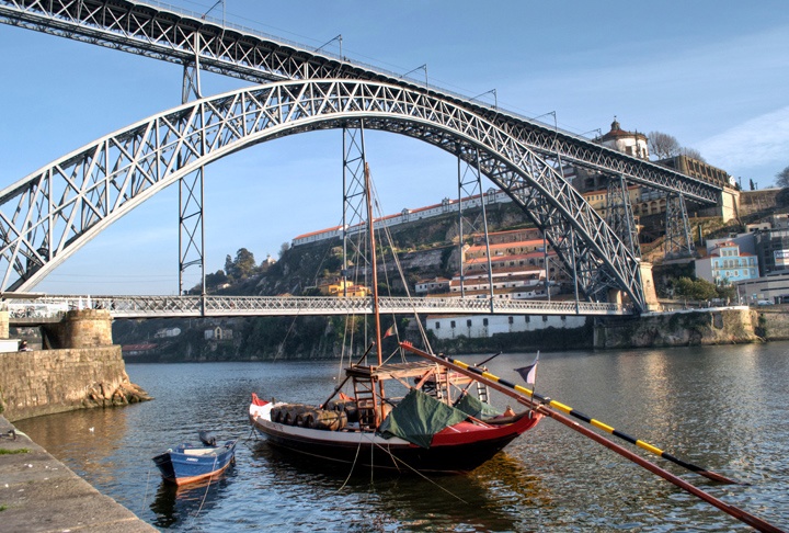 Port barge under the Dom Luis Bridge in Porto