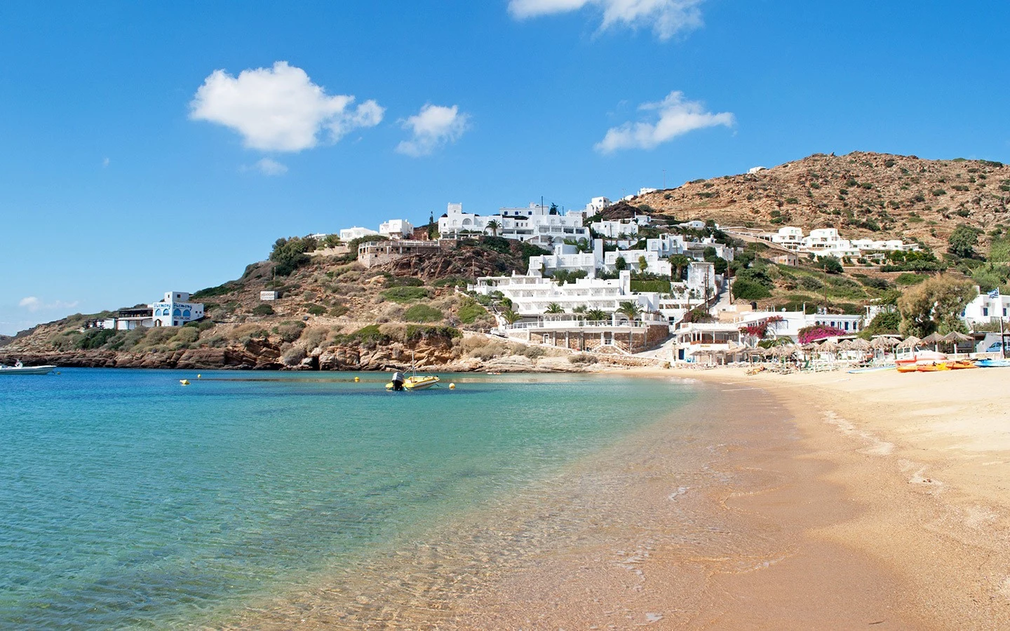 The golden sands of Mylopotas Beach off-season in Ios