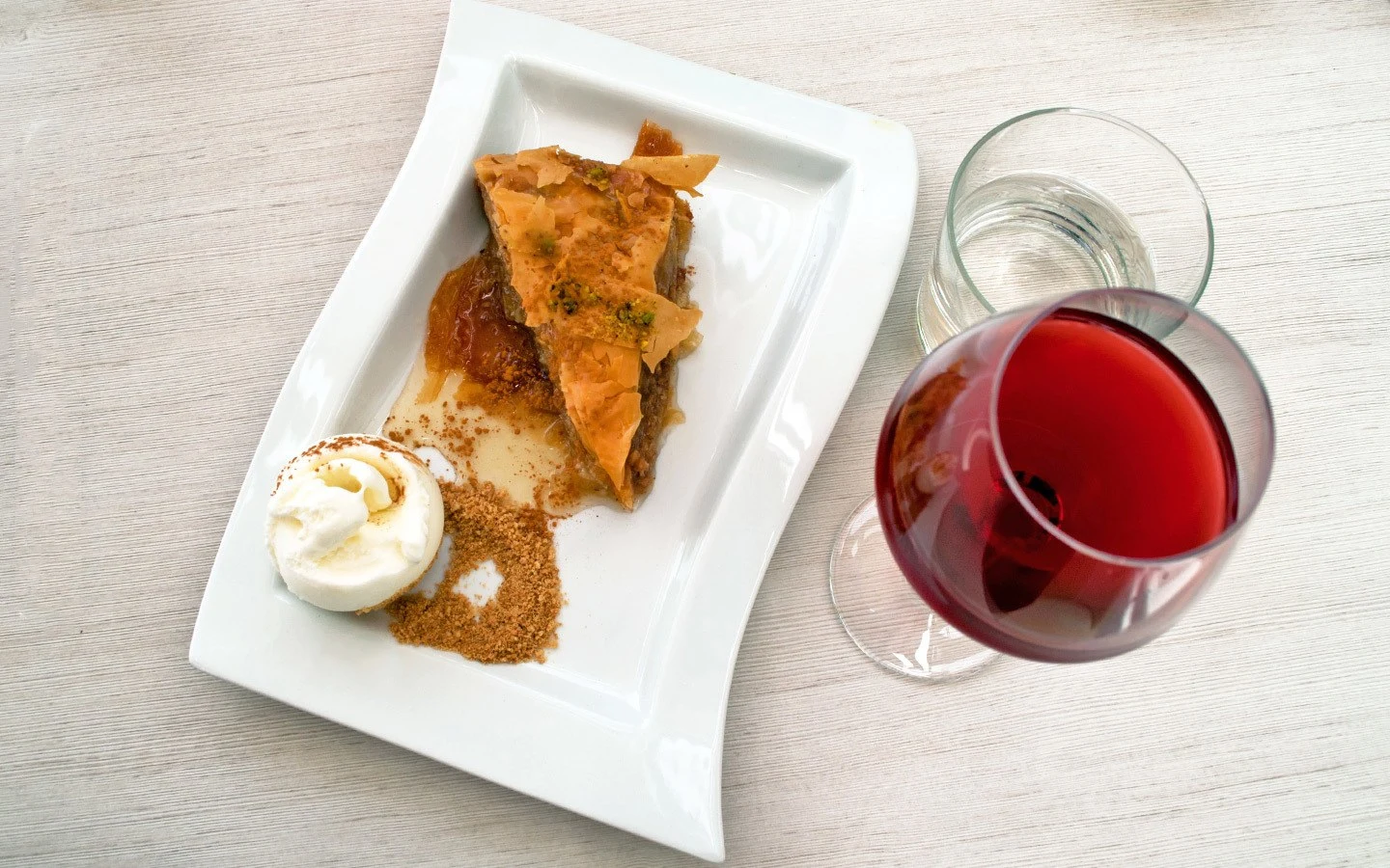 Baklava and rosé wine in Santorini Greece