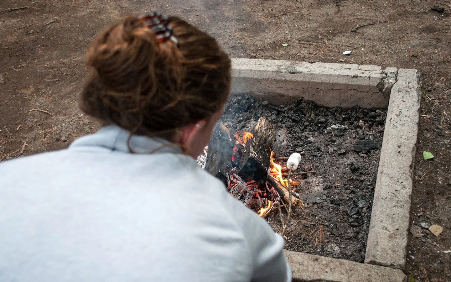 Toasting marshmallows on the campfire on a RV trip across Canada