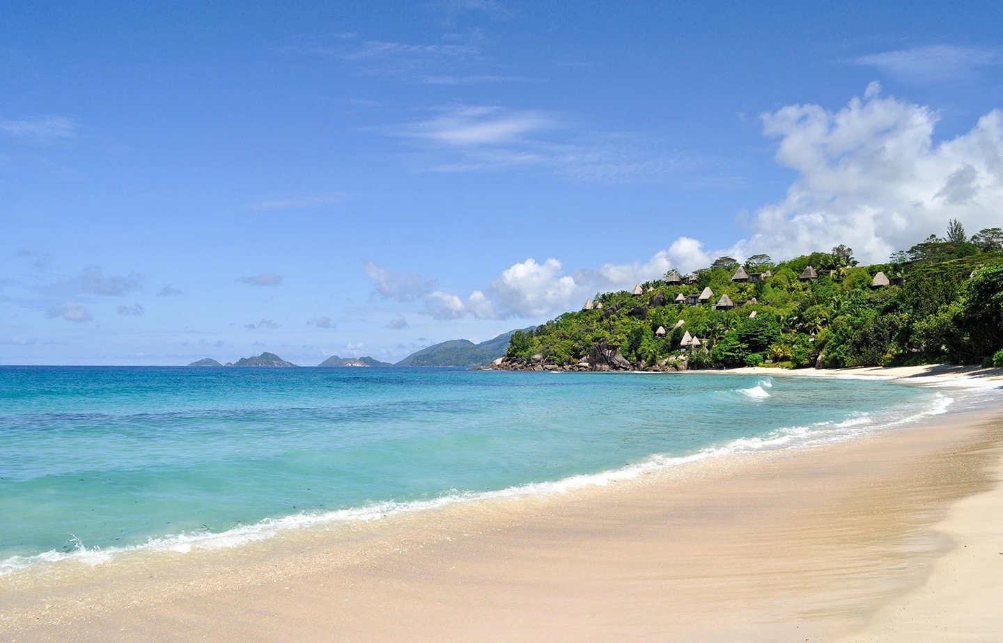 Golden sands at Anse Louis beach in the Seychelles