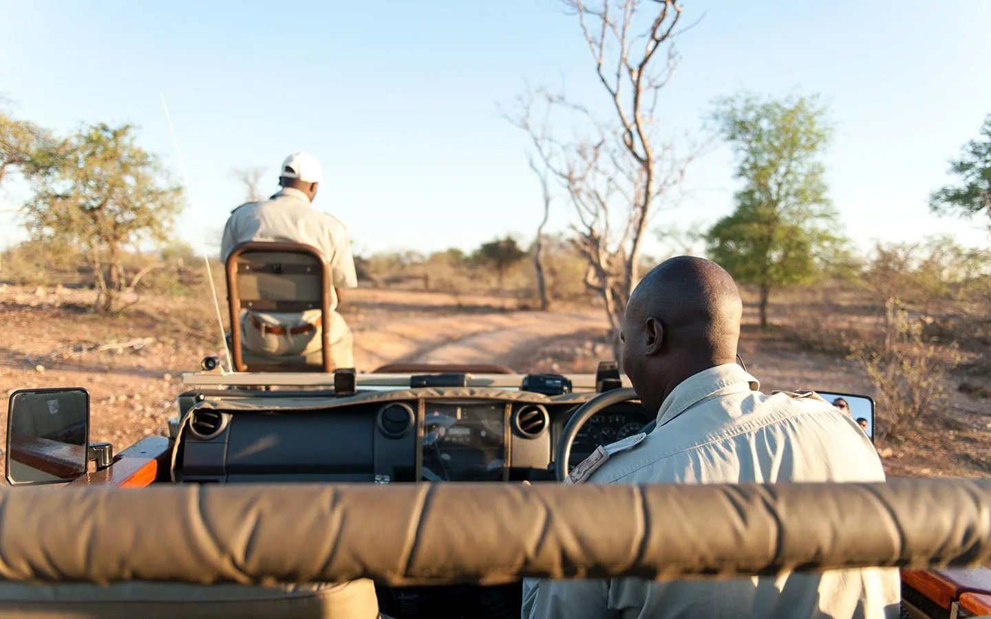 Our tracker and driver on a game drive at Naledi Game Lodge in South Africa