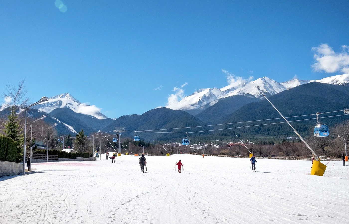 Skiers on the slopes at Bansko ski resort