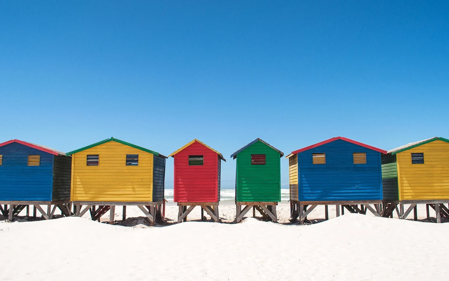 Colourful beach huts at Muizenberg beach, South Africa