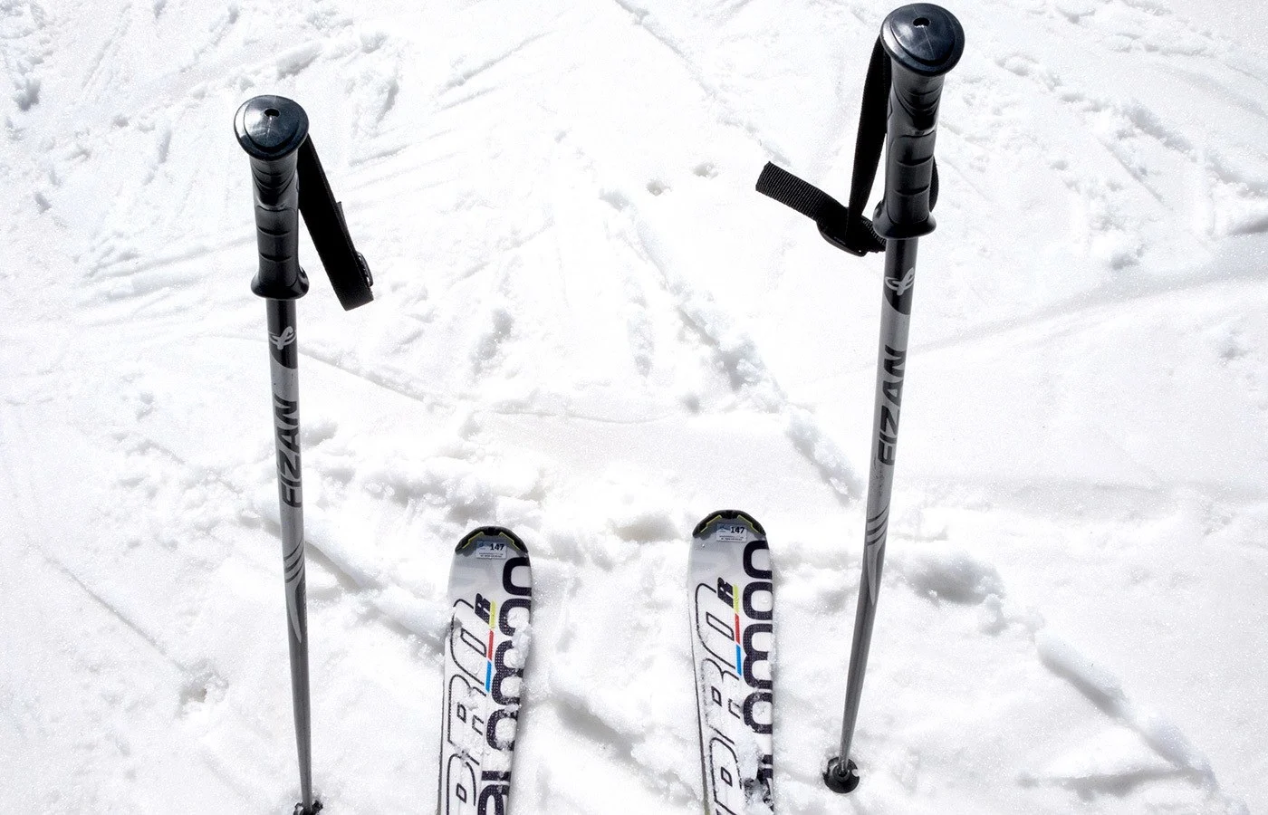 Skis and poles in the snow while skiing in Bulgaria