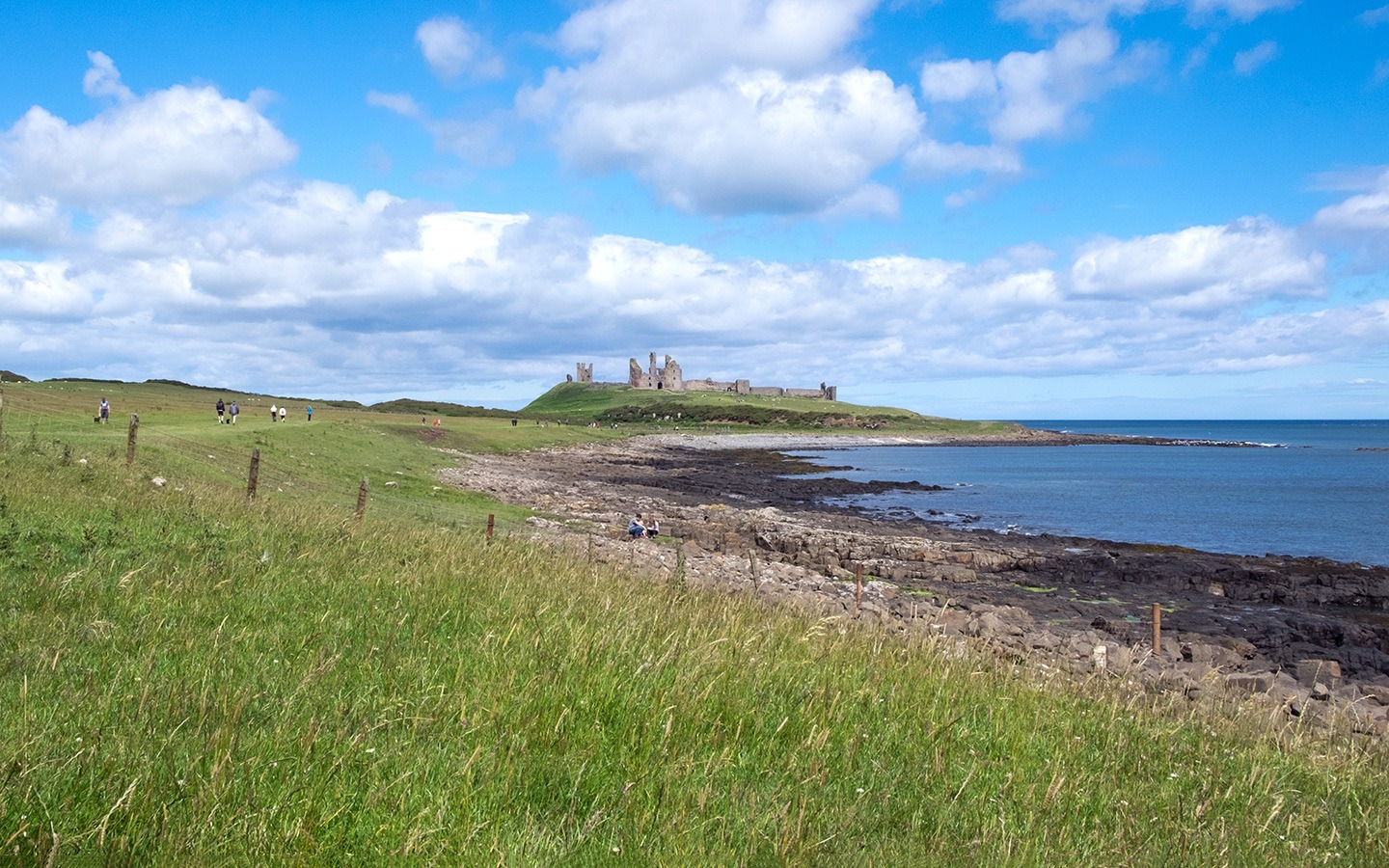 Walking along the coast path from Craster to Dunstanburgh