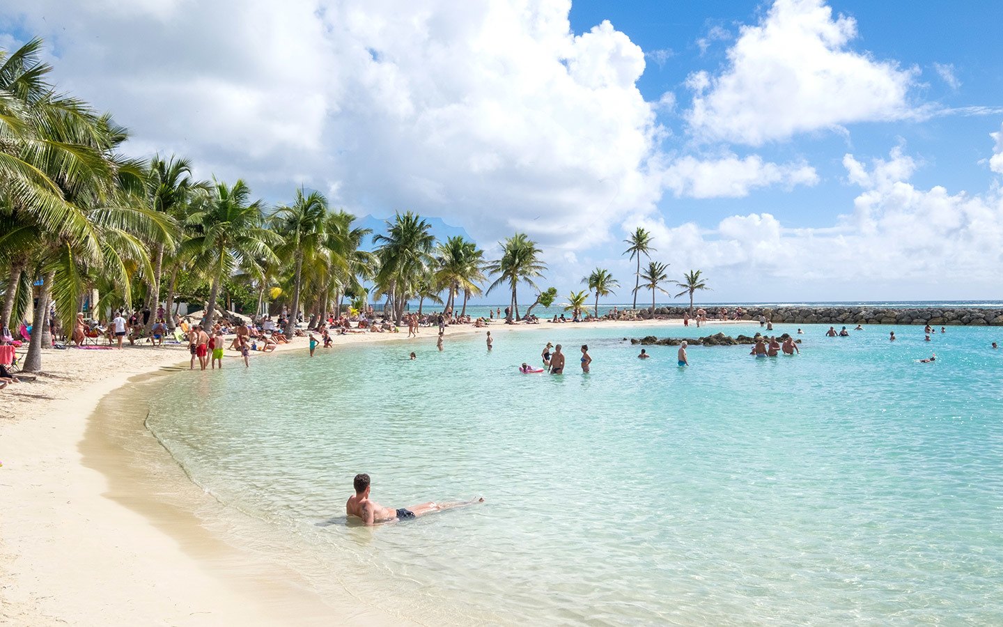 Relaxing on the beach in Saine-Anne in Grande-Terre