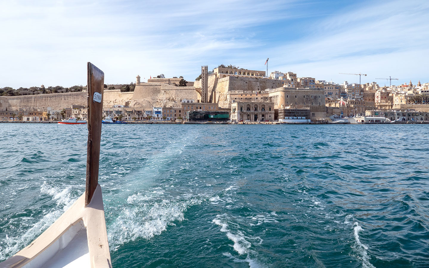 On board a traditional dgħajsa boat from Valletta to the Three Cities