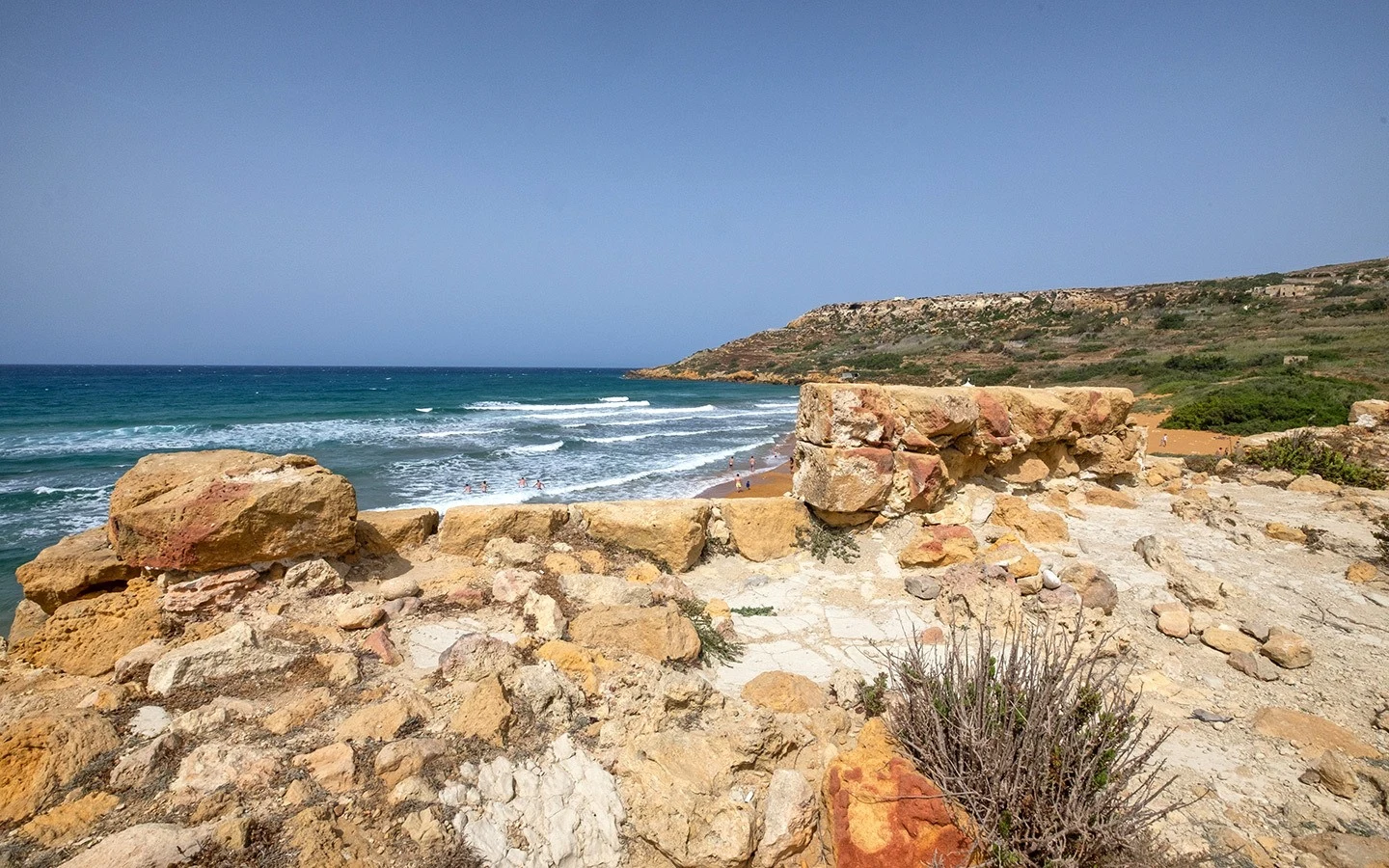 The red-gold sand beach of Ramla Bay, one of the best things to do in Gozo