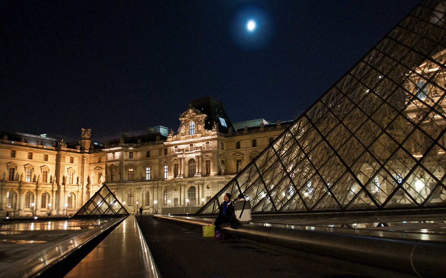 The Louvre museum in Paris at night
