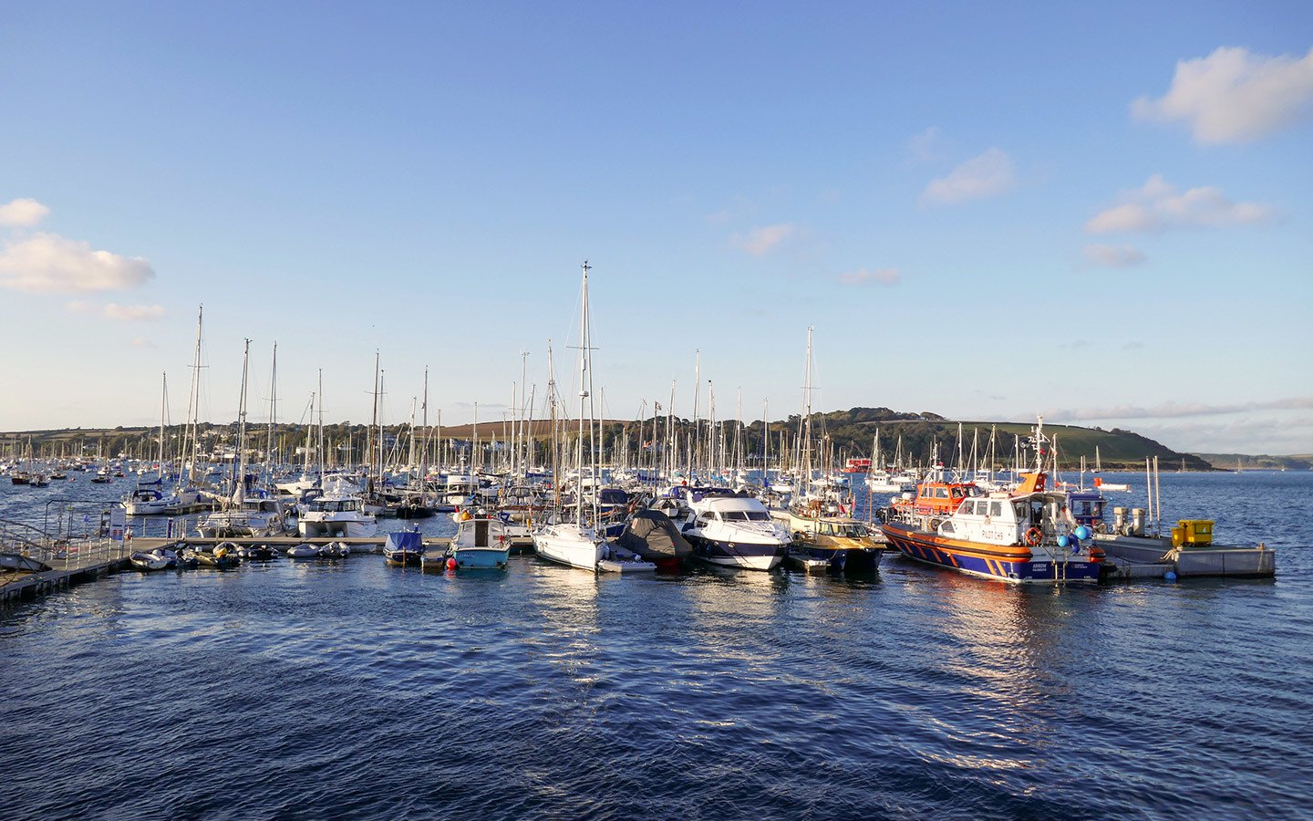 Boats in the harbour in Falmouth at sunset