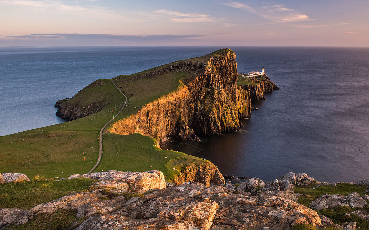 Neist Point lighthouse at sunset