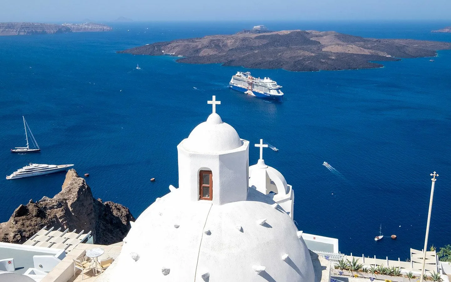 Celebrity Apex cruise ship docked in Santorini