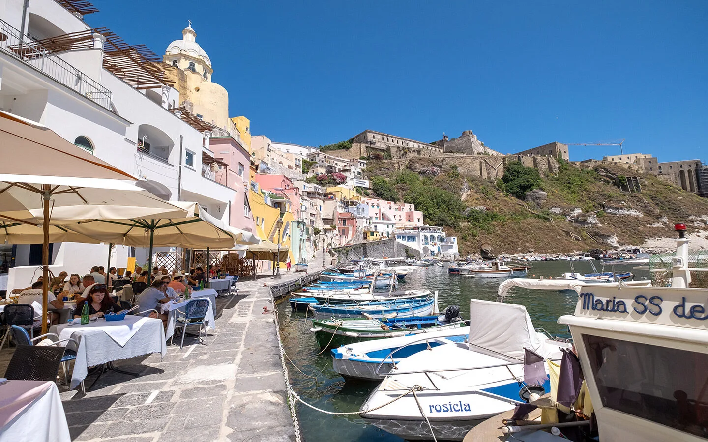 Waterfront restaurants in picturesque Marina Corricella, one of the best things to do in Procida