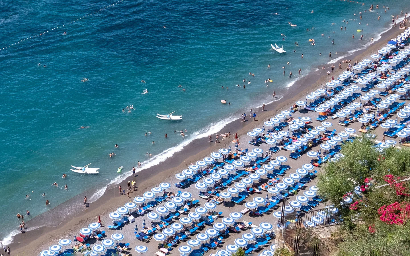 Sunbeds at beach clubs on Positano's Marina Grande