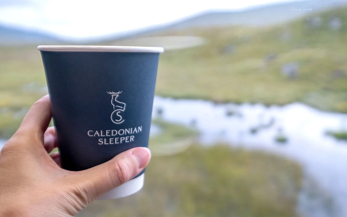 Morning coffee with a view on the Caledonian Sleeper overnight train to Scotland