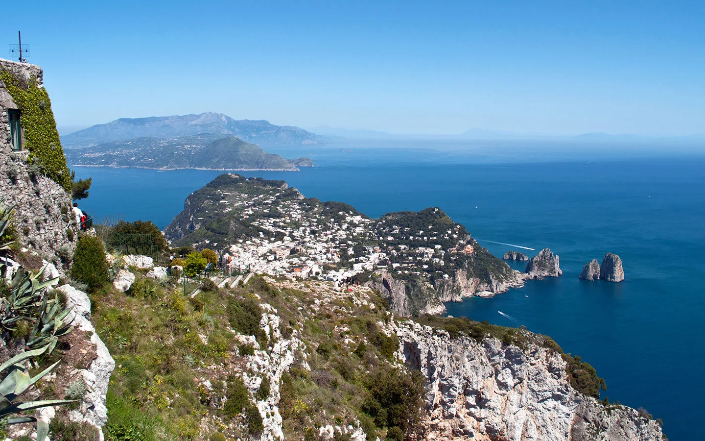 Views of Capri town and the Faraglioni rock formations from Monte Solaro