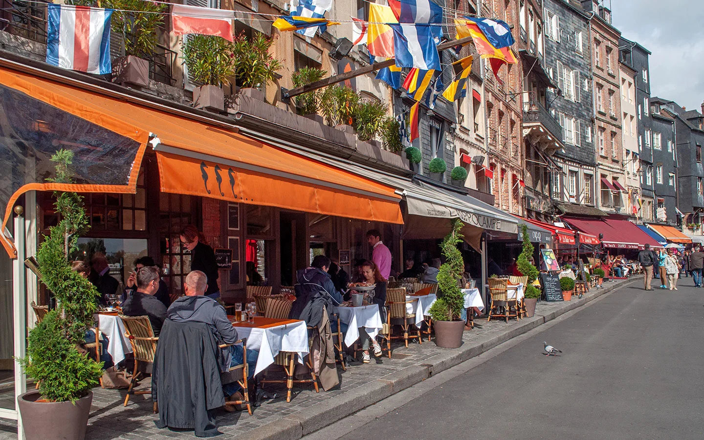 Cafés and restaurants along the waterfront in Honfleur, France
