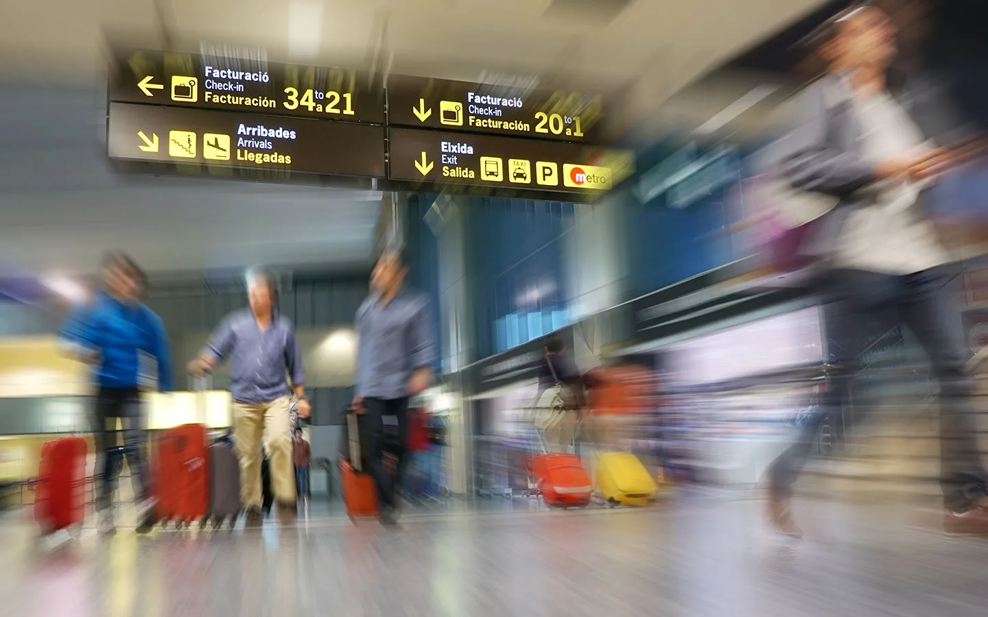 Long-exposure photo of people at an airport