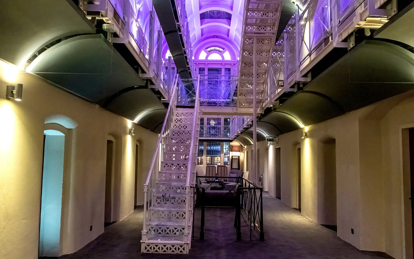 The main atrium of the Malmaison Oxford at night