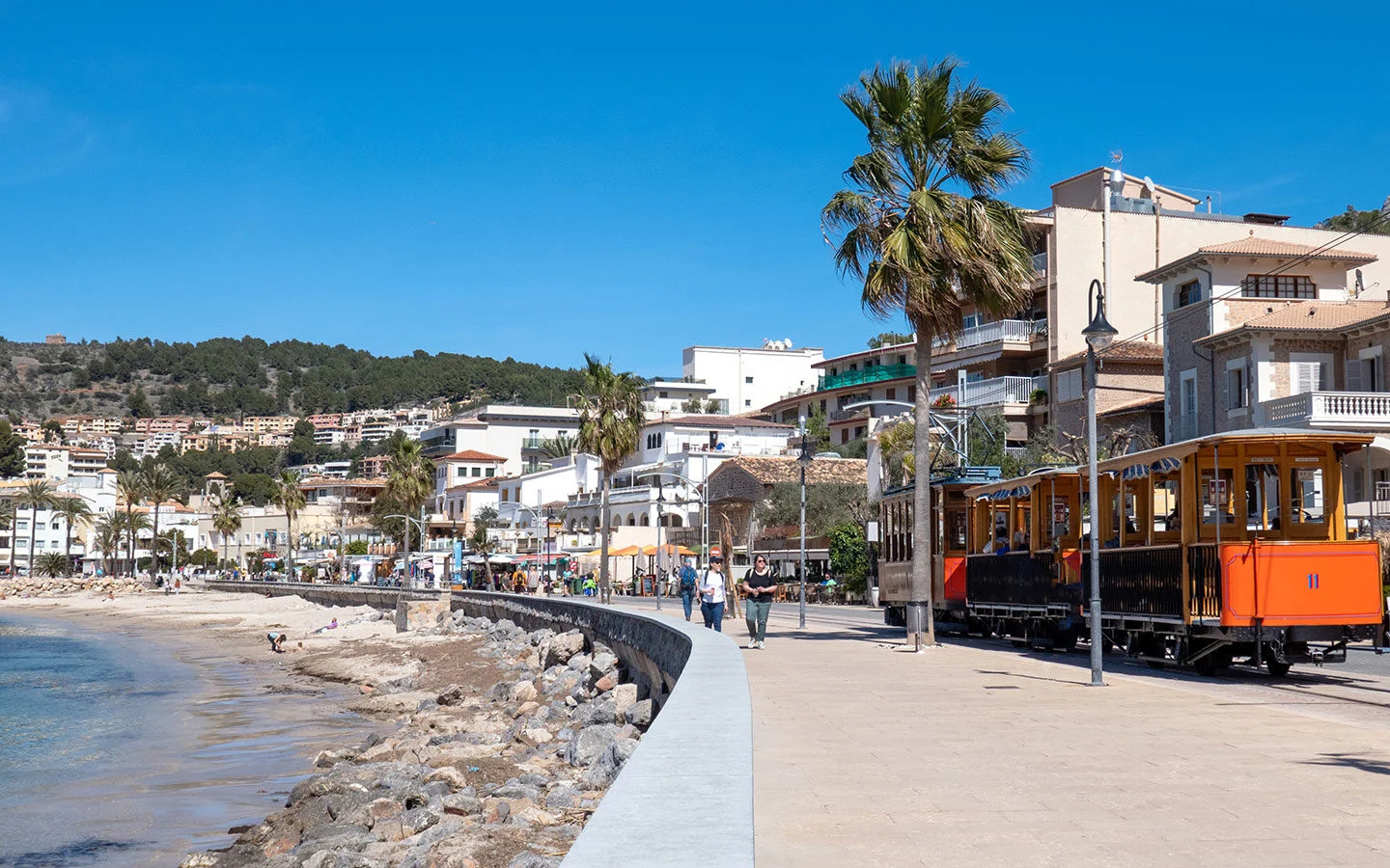 Tram running along the waterfront in Port de Sóller, Mallorca