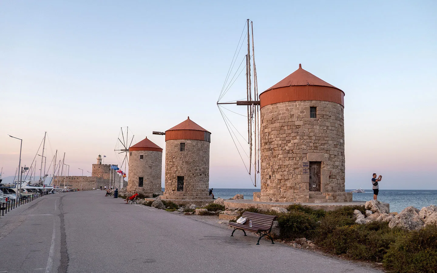 The three Windmills of Mandraki in Rhodes Town at sunset