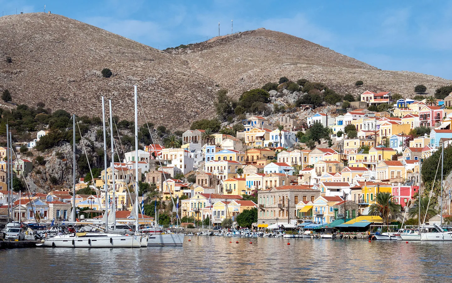 Colourful buildings in Symi harbour in Greece