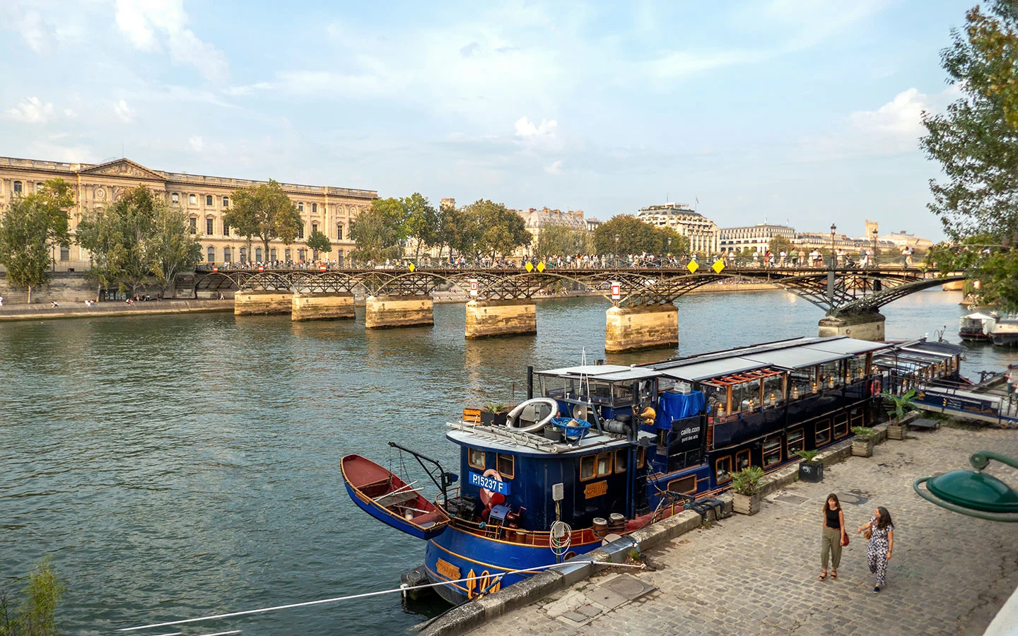 Sunset on the Pont des Arts and the Louvre in Paris